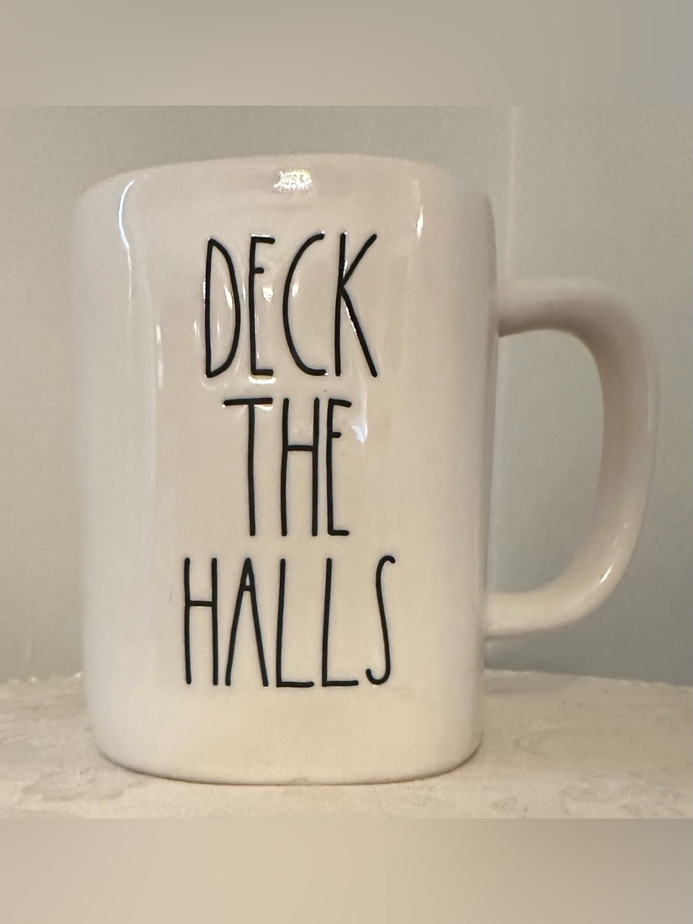 White ‘Deck The Halls’ Mug With Christmas Tree on the Back by Rae Dunn